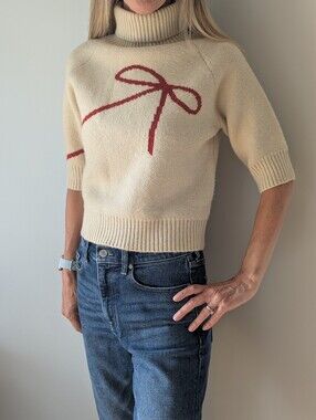 Anthropologie En Saison Cream Turtleneck Sweater with Red Bow
